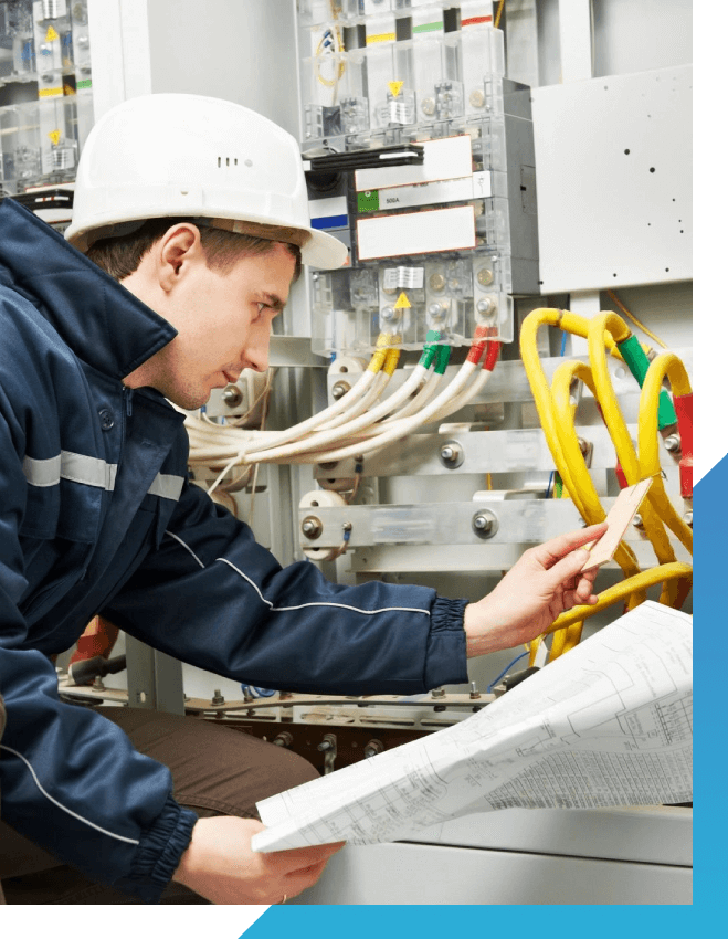 Electrician builder at work inspecting cabling connection of high voltage power electric